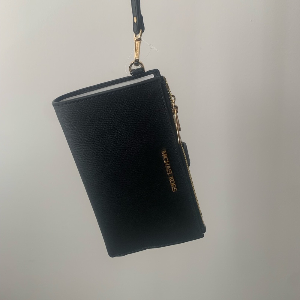 Michael Kors wrist wallet. Black. New with tags.
